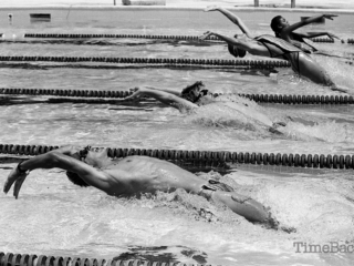 Swimmers race at the Lions Pool