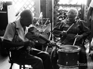 A drummer and a fiddler