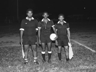 Football referees pose for a photo