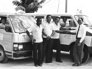 Holiday taxi drivers pose for a photo