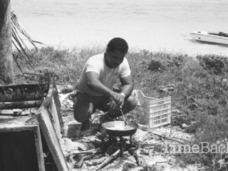 Frying fish, Cayman Brac, 1985