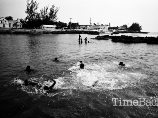 Children swimming in George Town Harbour, Hog Sty Bay, 1986