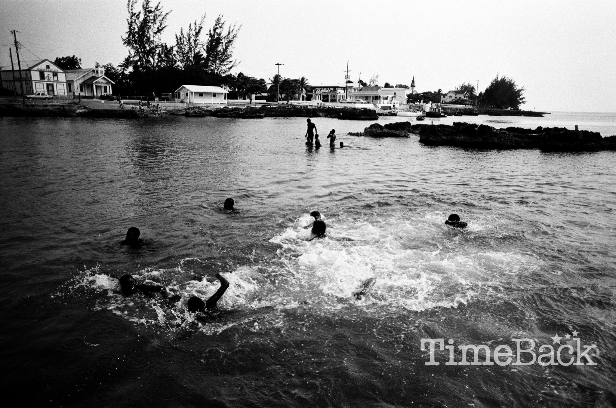 Kids swimming in George Town Harbour, Hog Sty Bay, 1986