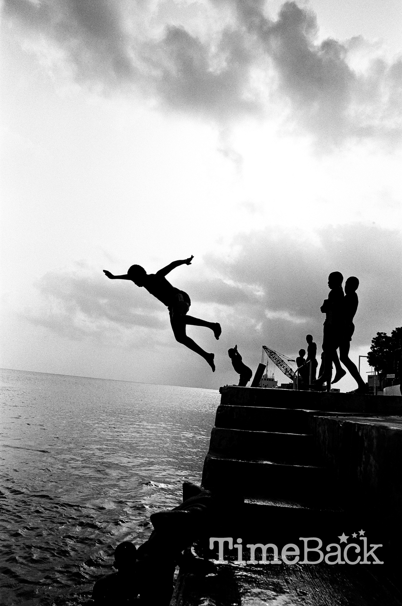 Kids Jumping of Dock in George Town Harbour, Hog Sty Bay, 1986